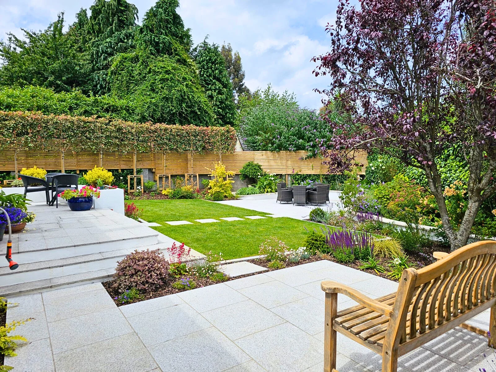 Hard vs soft landscaping garden ideas combining paving, walls and planting in Ireland
